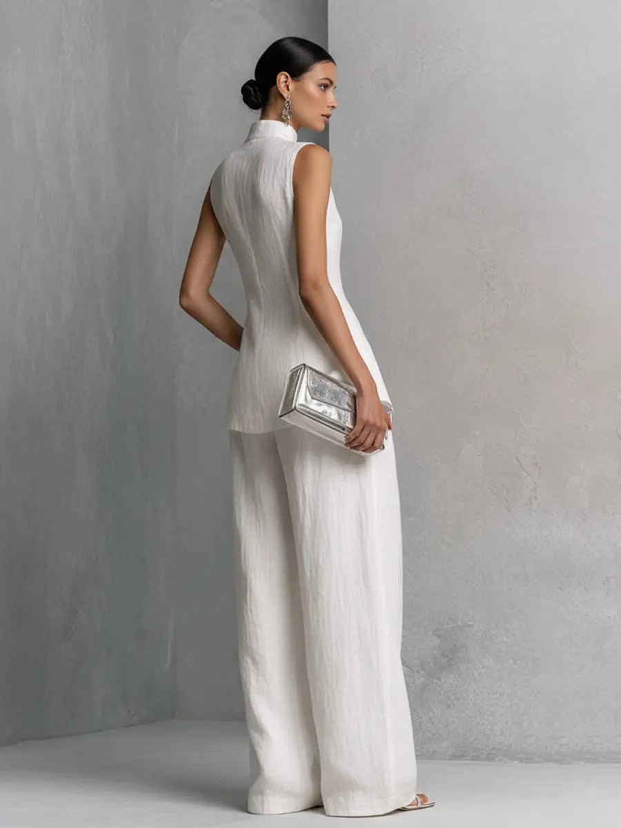 Sleek women's stand-collar top and wide-leg pants, forming an elegant two-piece set for any occasion.