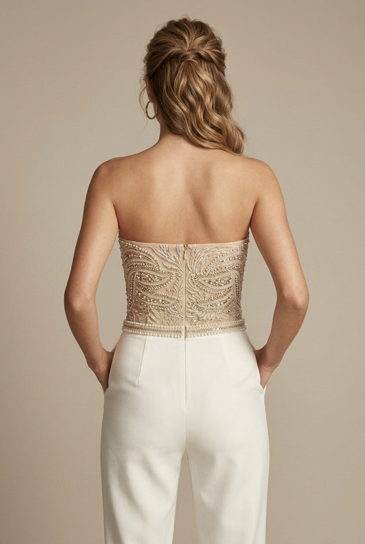 Stylish modern women's strapless jumpsuit, tailored for elegance, featuring a flattering sweetheart design.