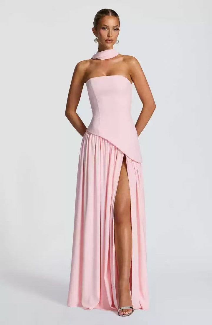 Women's occasion wear: elegant strapless maxi dress with a stylish leg slit, ensuring a stunning formal look.