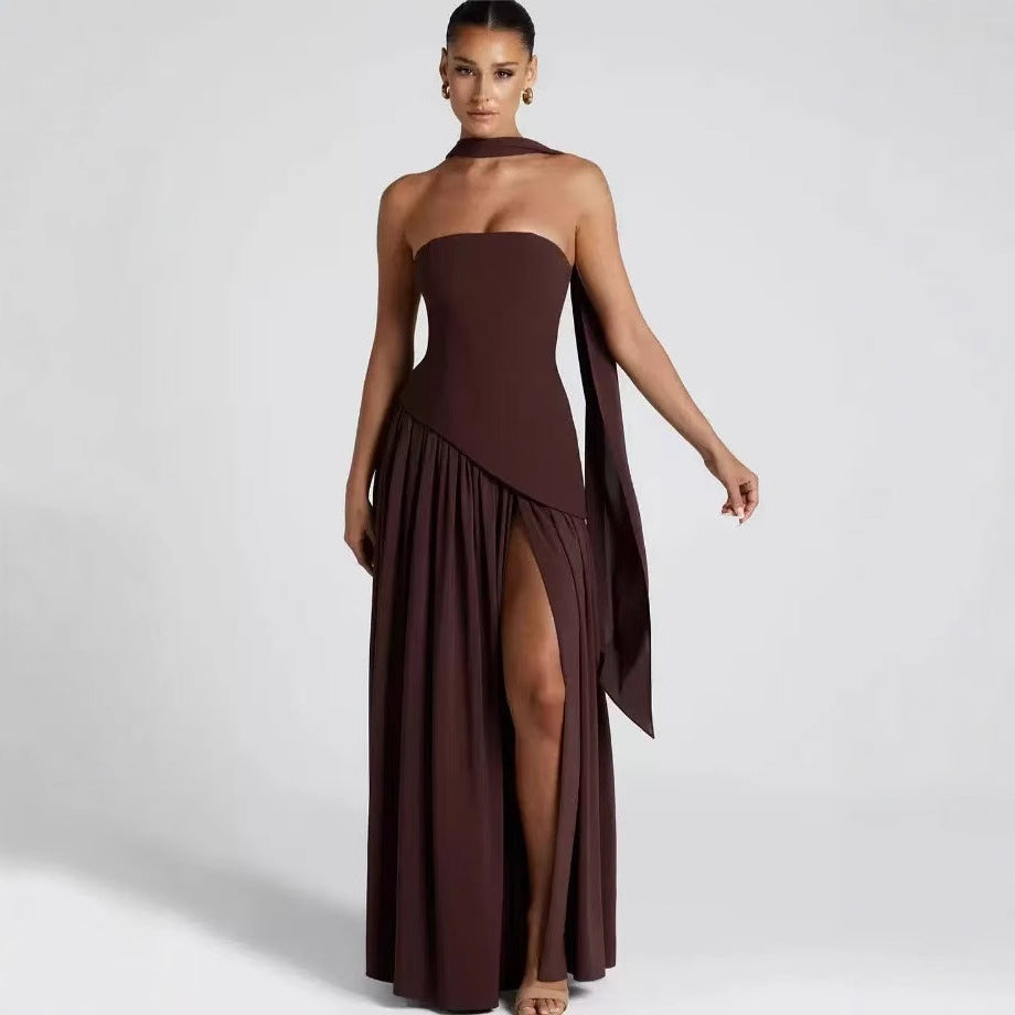 Women's formal strapless evening gown. Long maxi dress with an elegant high slit, suitable for special occasions.