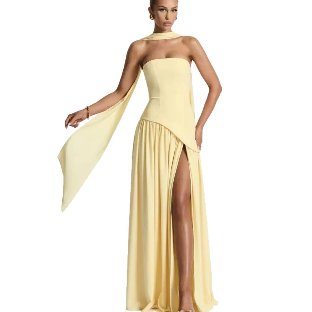 Full-length women's elegant strapless maxi dress. Features a stylish leg split, perfect for any formal occasion.