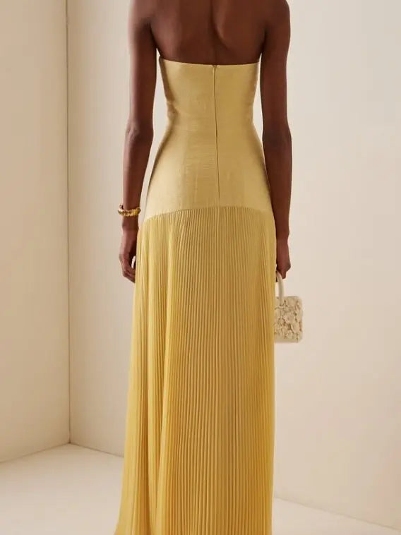 Fashionable women's strapless long dress, an elegant pleated maxi gown for evening wear and special occasion glamour.