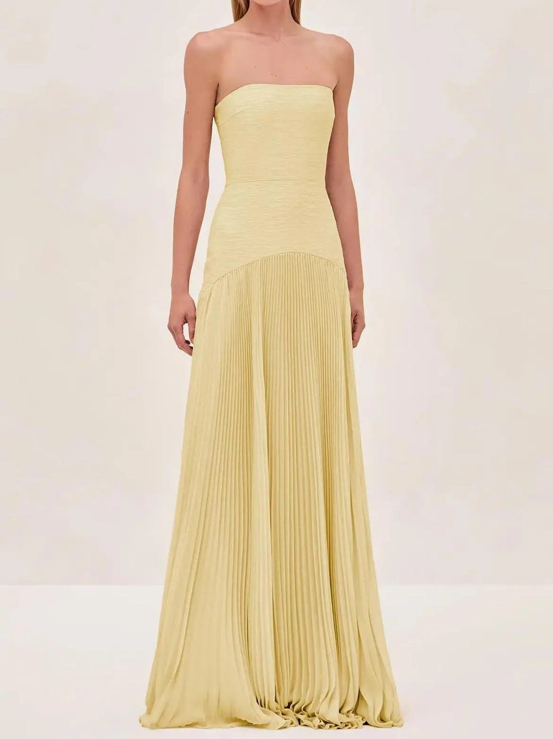 Women's strapless maxi dress featuring a full pleated skirt, an elegant choice for evening events & formal gatherings.