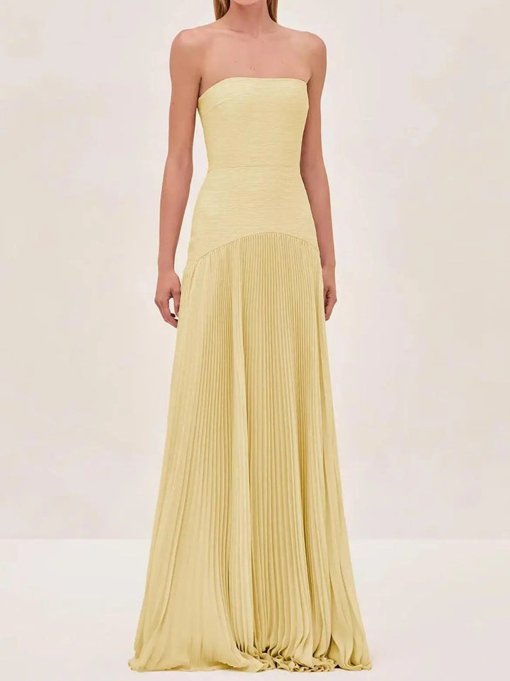 Women's strapless maxi dress featuring a full pleated skirt, an elegant choice for evening events & formal gatherings.