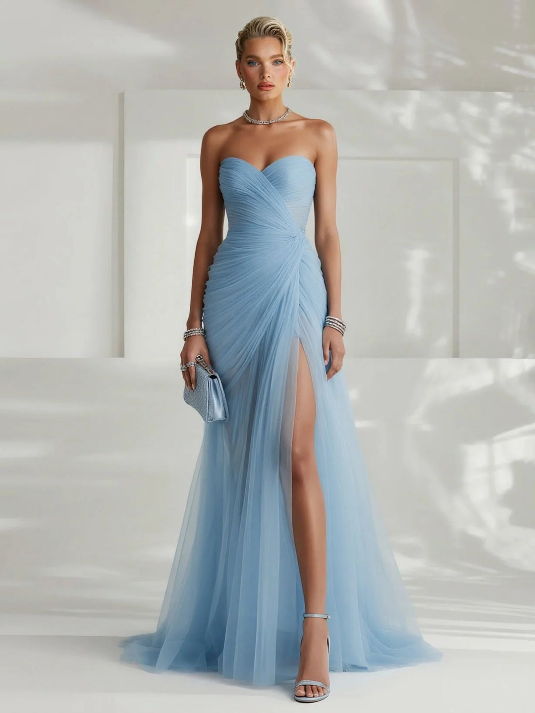 Elegant women's strapless pleated maxi dress in black, perfect for formal events & evening wear.