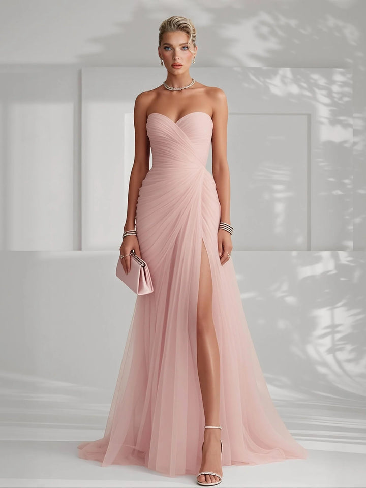 Chic strapless pleated maxi dress for women, ideal as a wedding guest or prom dress. Formal long gown.