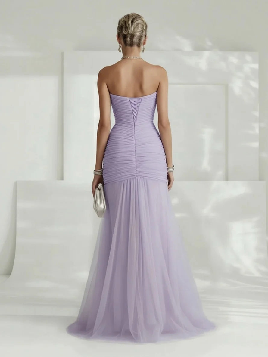 Beautiful women's strapless pleated maxi dress. A formal evening gown designed for elegance at special events.