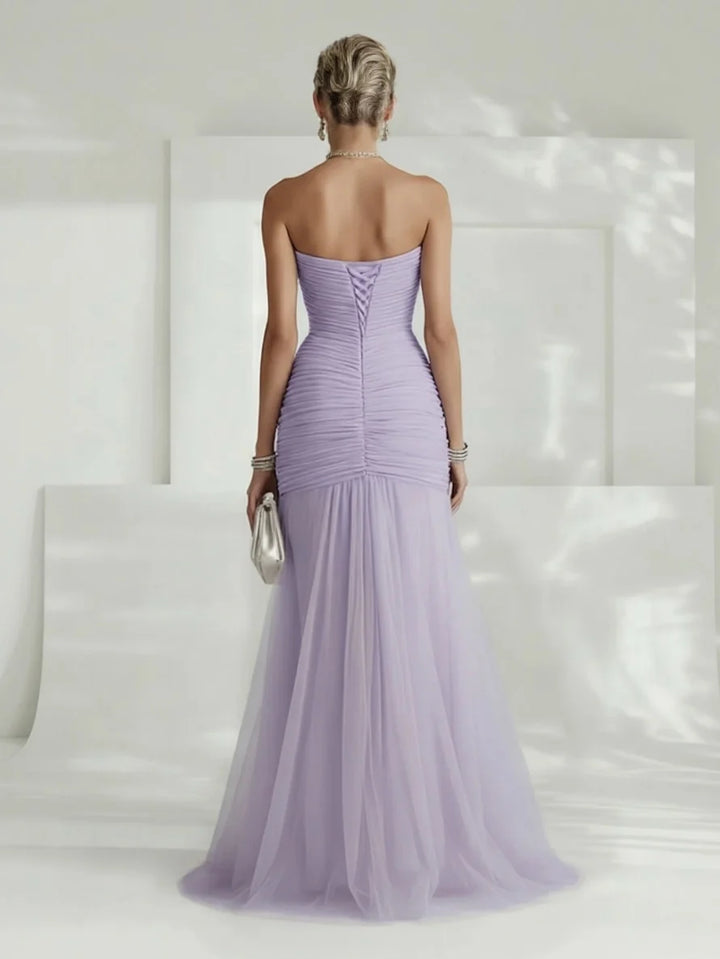 Beautiful women's strapless pleated maxi dress. A formal evening gown designed for elegance at special events.