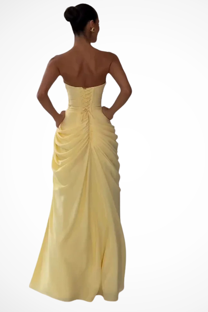 Versatile women's strapless ruched maxi dress with a slit, perfect as an evening gown or wedding guest attire.