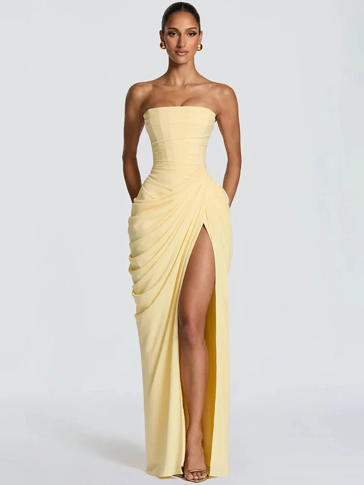 Elegant women's strapless ruched maxi dress with high slit, perfect for formal evening parties.