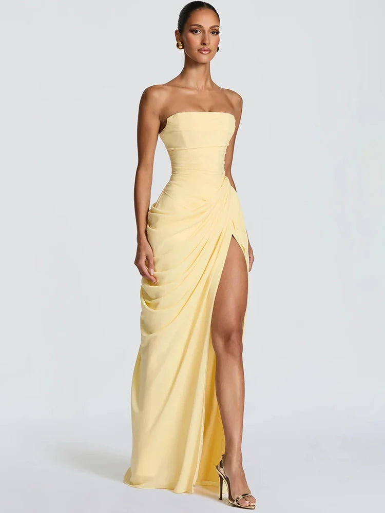 Sophisticated strapless ruched maxi dress for women, featuring a stylish high slit. Great for formal events.