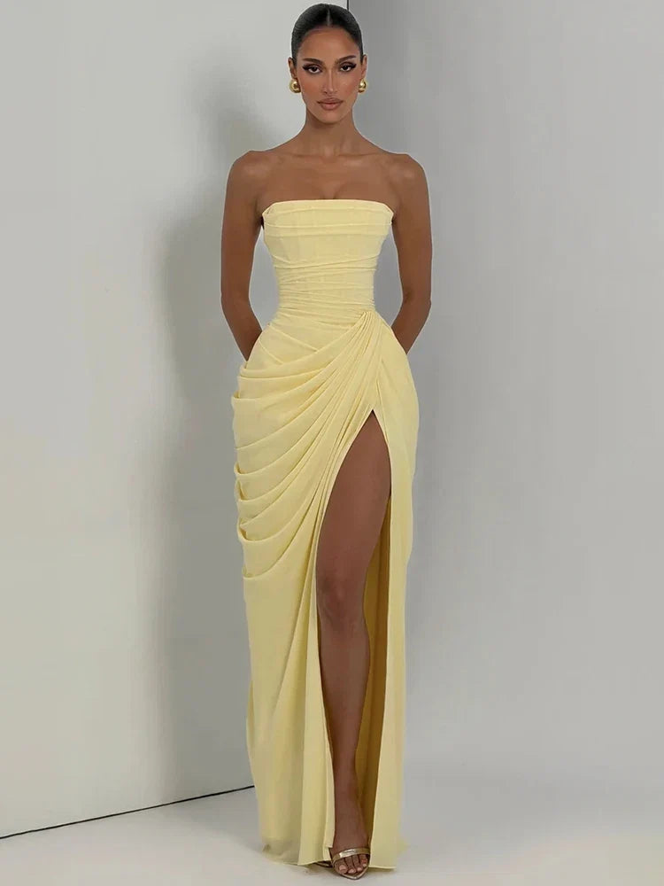 Stunning strapless ruched maxi evening dress with a high slit, perfect for formal parties & special occasions.