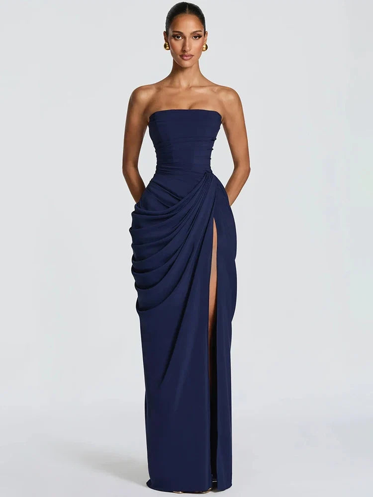 Elegant women's sleeveless ruched evening gown with a high slit. Perfect strapless maxi for formal events.