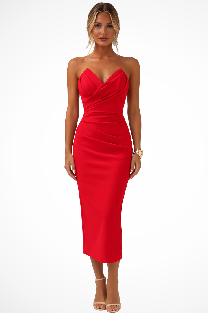 Woman wearing an elegant strapless ruched sweetheart midi dress, showcasing its perfect party fit.