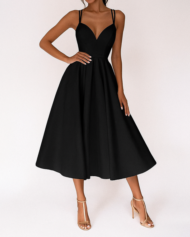 Formal women's elegant strappy midi dress, perfect for a wedding, evening party, or any special occasion. Sophisticated style.
