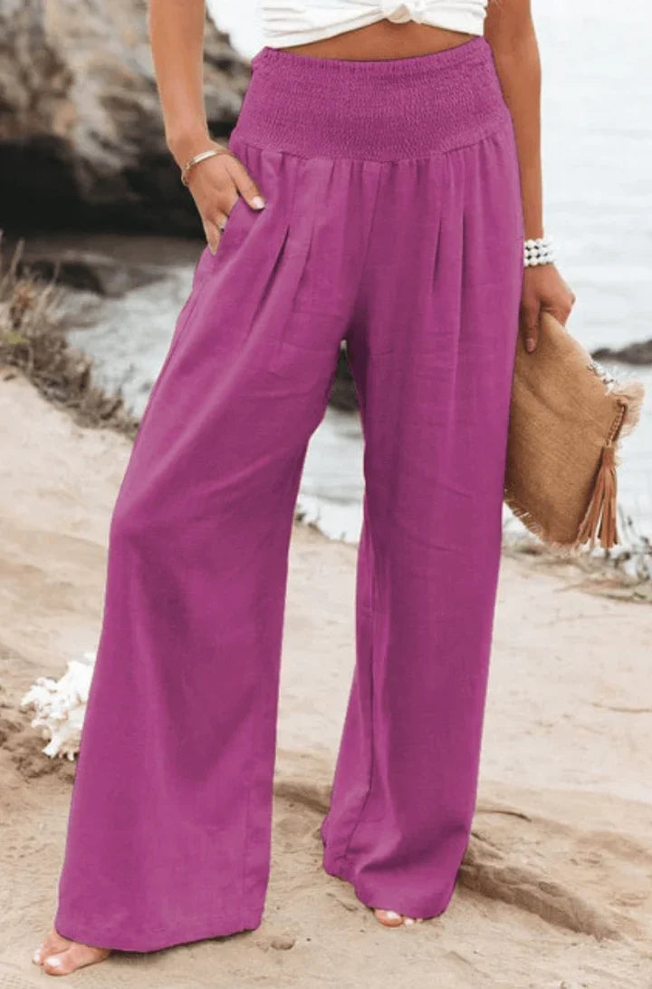 Flowy wide-leg palazzo pants for women, offering a comfortable, elegant, and breezy fit for any occasion.