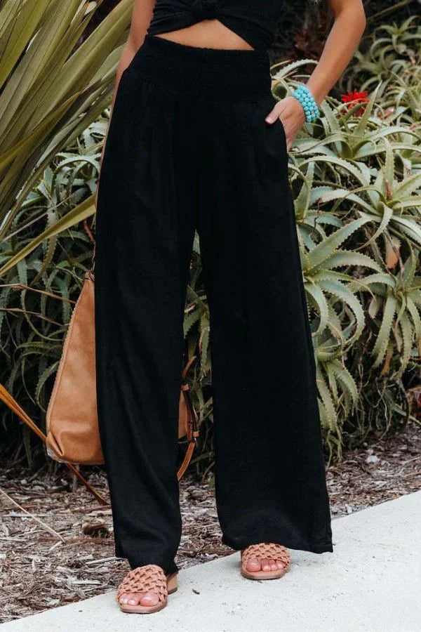 Fashionable women's wide-leg palazzo pants, high-waisted, stretchy, and elegant for a modern look.