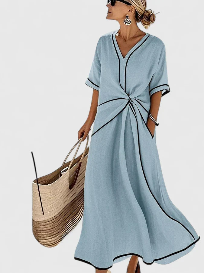Blue and beige striped midi dress for women. Comfortable & breathable summer dress, ideal for elegant casual wear or vacation.