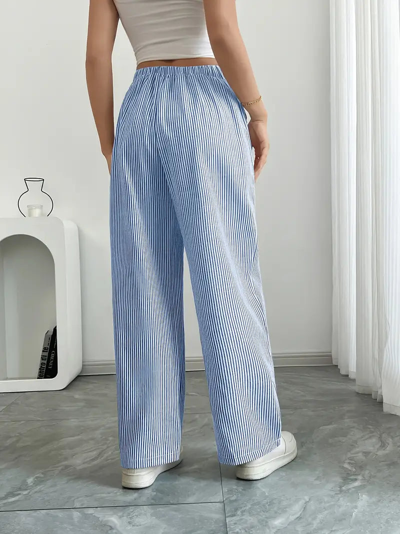 Stylish striped spring fashion pants for women, wide-leg design with practical pockets.