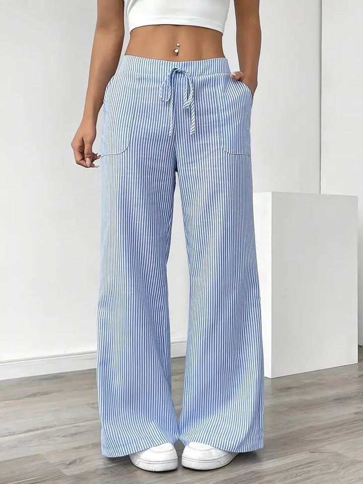 High-waist striped spring fashion pants for women with practical side pockets.