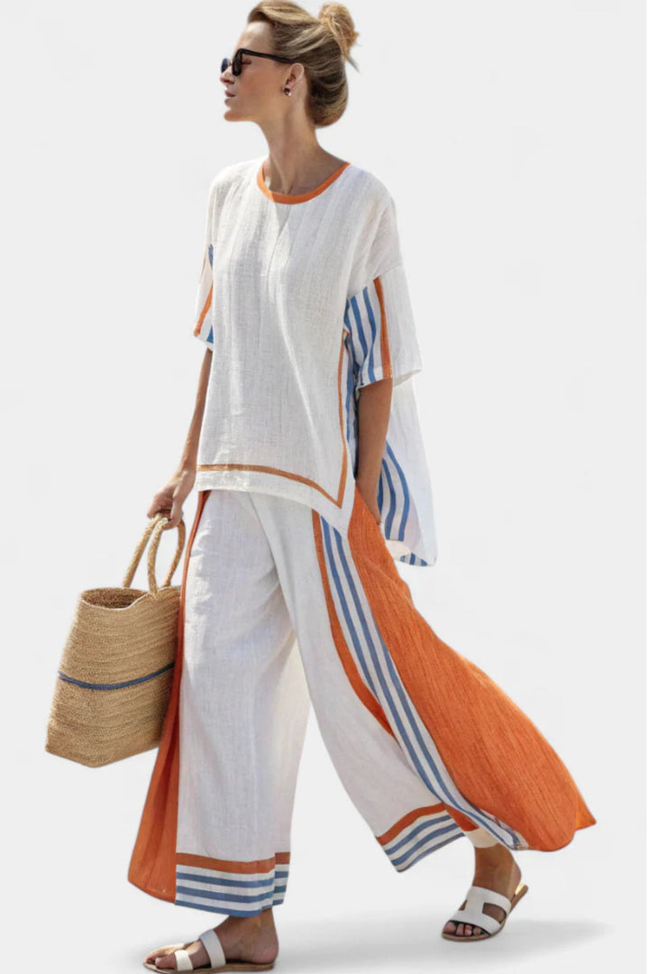 Elegant women's striped two-piece pant set with wide-leg pants, perfect for versatile fashion & travel.