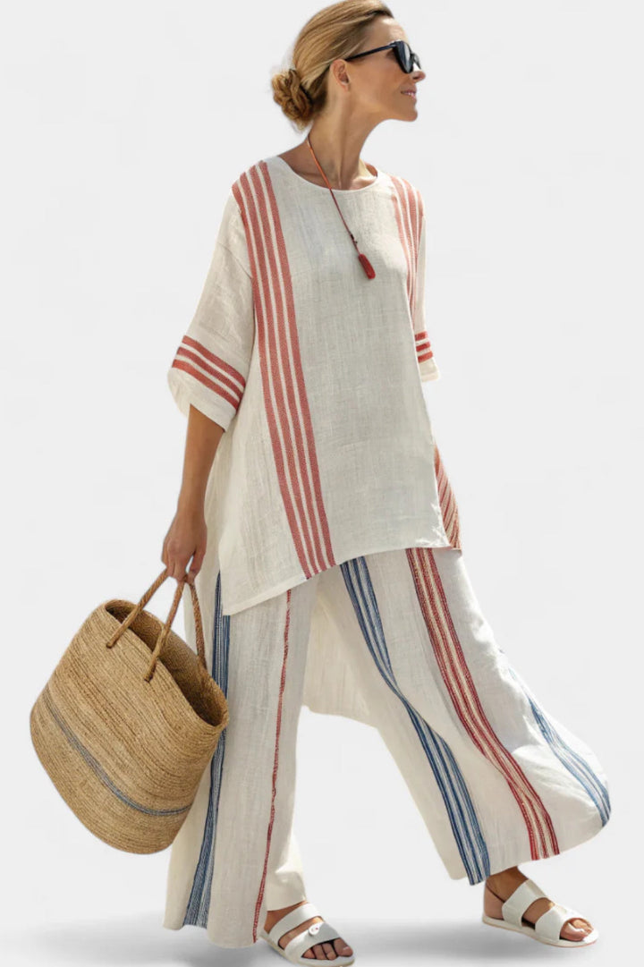 Comfortable women's two-piece striped pant set, featuring an elegant top & wide-leg pants for casual wear.