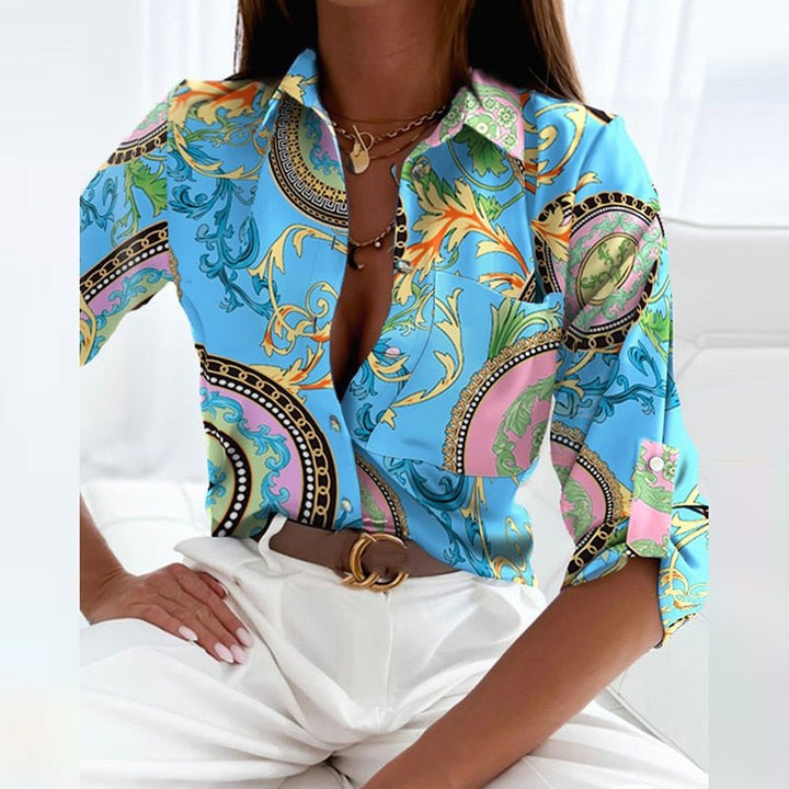 Stylish women's structured button-front blouse. Elegant for work or a smart casual, professional look.
