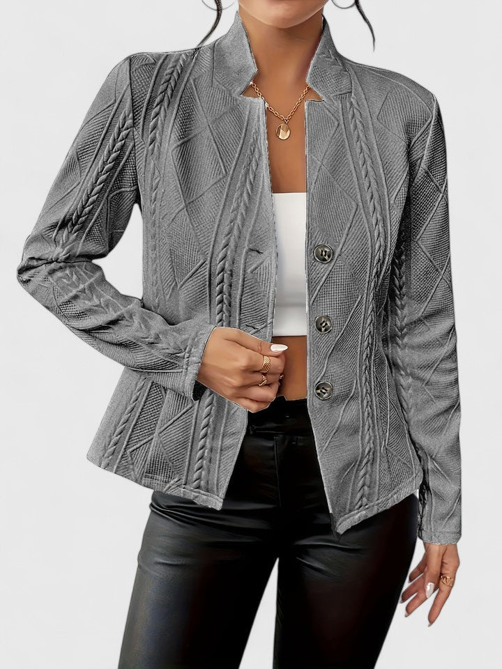 Stylish women's tailored jacket, offering a sophisticated look for smart casual and business settings.