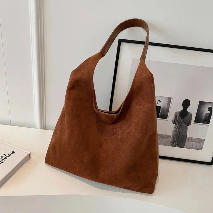 Elegant women's suede shoulder tote bag in a minimalist style, a perfect daily accessory.