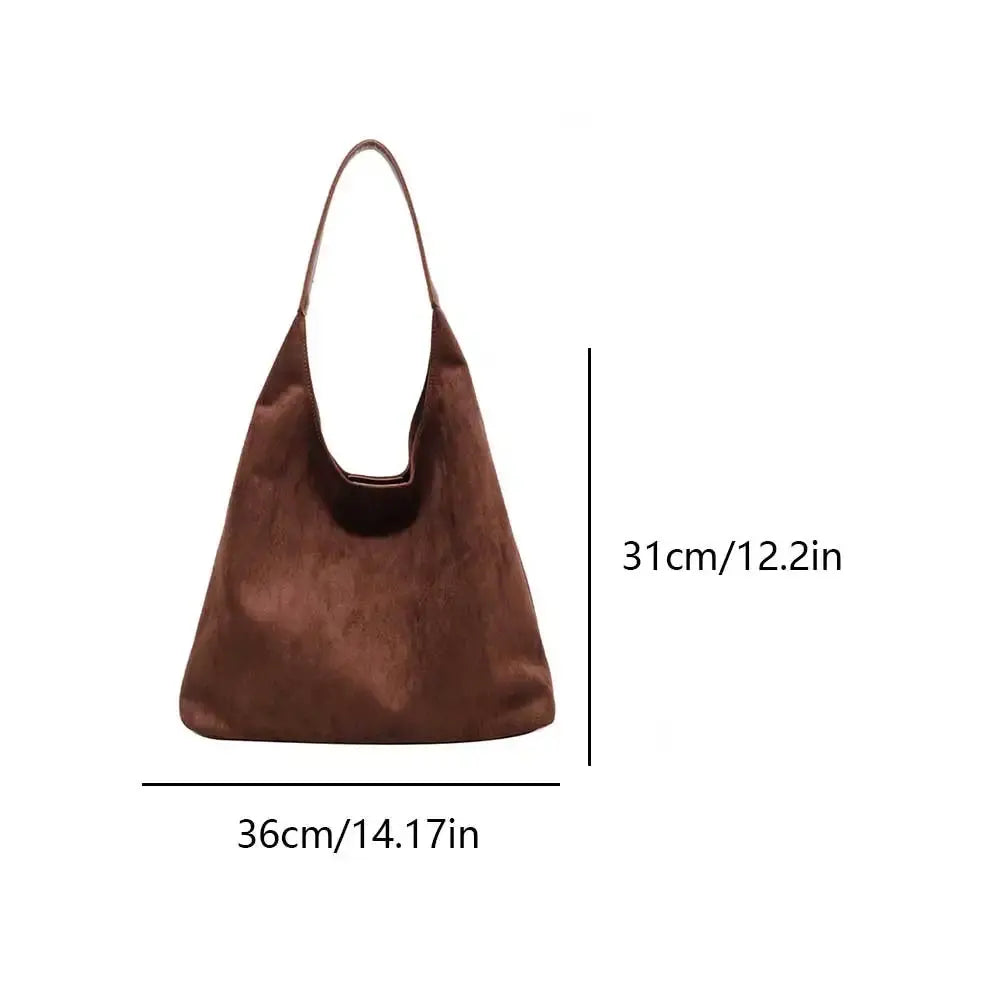 Back view of the chic women's suede tote bag, a timeless and elegant fashion statement.