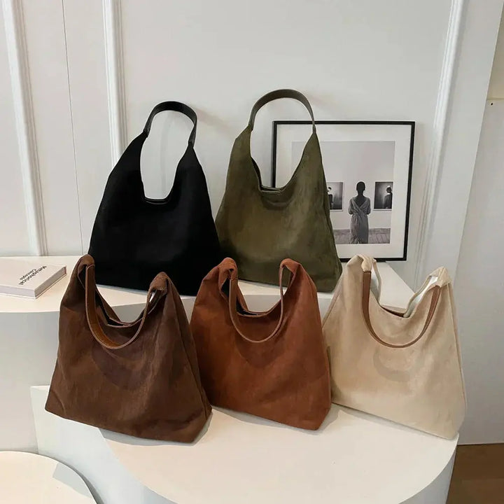 Interior view of the spacious women's suede tote bag, perfect for all daily essentials.