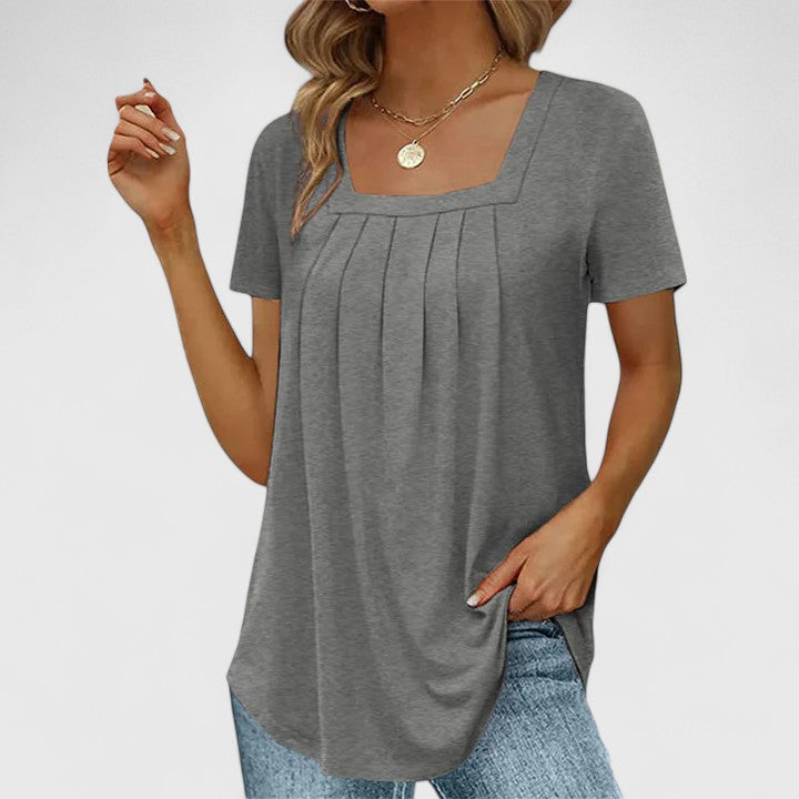 Elegant women's summer blouse with square neck and short sleeves, perfect for sophisticated warm-weather style & casual wear.