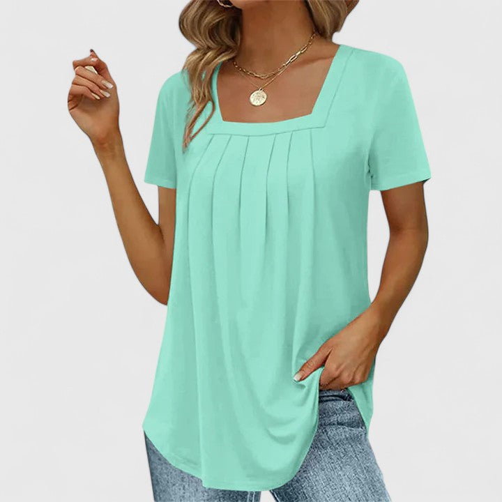 Sophisticated women's square neck blouse, a chic short-sleeve summer top for elegant casual wear and warm weather.