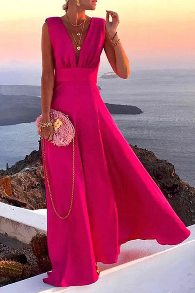 Elegant women's summer midi dress, flowy and colorful, perfect for vacation or a garden party.