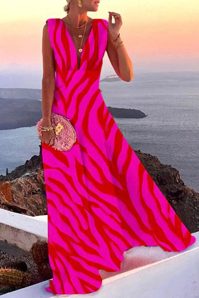 Flowy colorful women's summer dress, elegant midi length, perfect for garden parties or beach vacations.