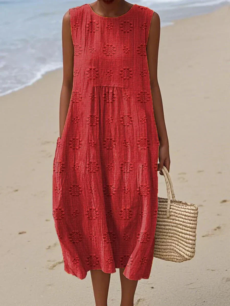 Versatile women's day dress, an elegant midi for summer or spring. Sleeveless design with comfortable pockets.
