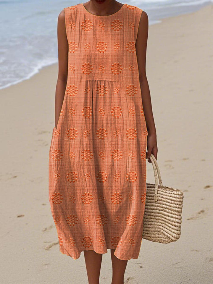 Stylish embroidered women's midi dress, perfect for summer vacation. Comfortable, elegant, and features convenient pockets.