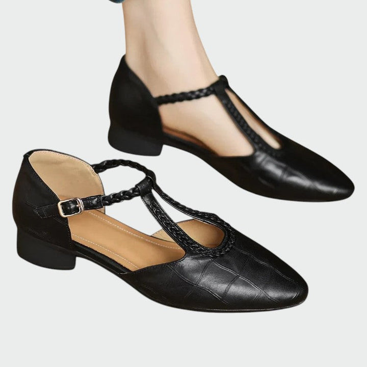 Elegant women's T-Bar Mary Jane shoes with a pointed toe and comfortable block heel, perfect for everyday wear.
