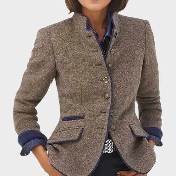 Elegant women's tailored blazer for professional wear. Chic long sleeve jacket, perfect for modern office fashion.