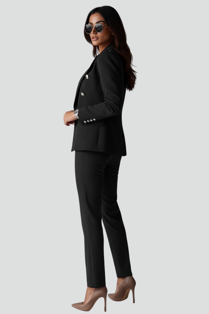 Modern women's tailored blazer, part of an elegant two-piece suit, ideal for sophisticated professional wear.