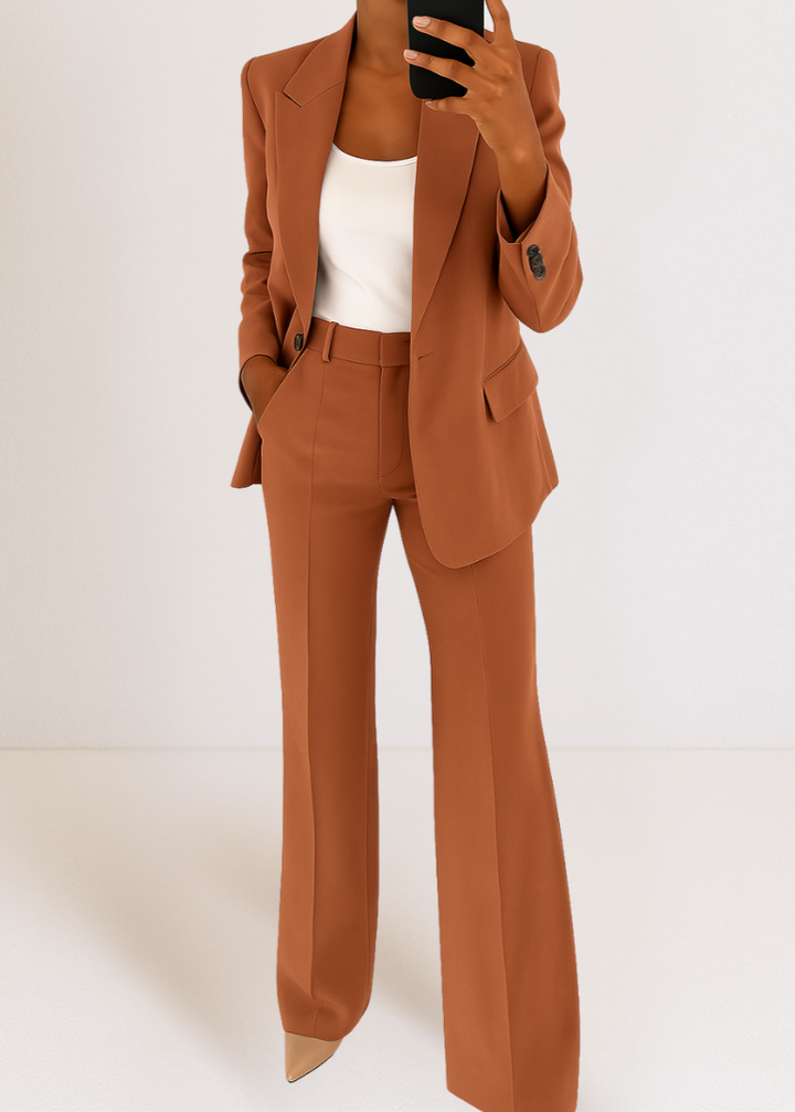 Professional women's tailored blazer and trouser matching set, ideal for elegant workwear or smart occasions.