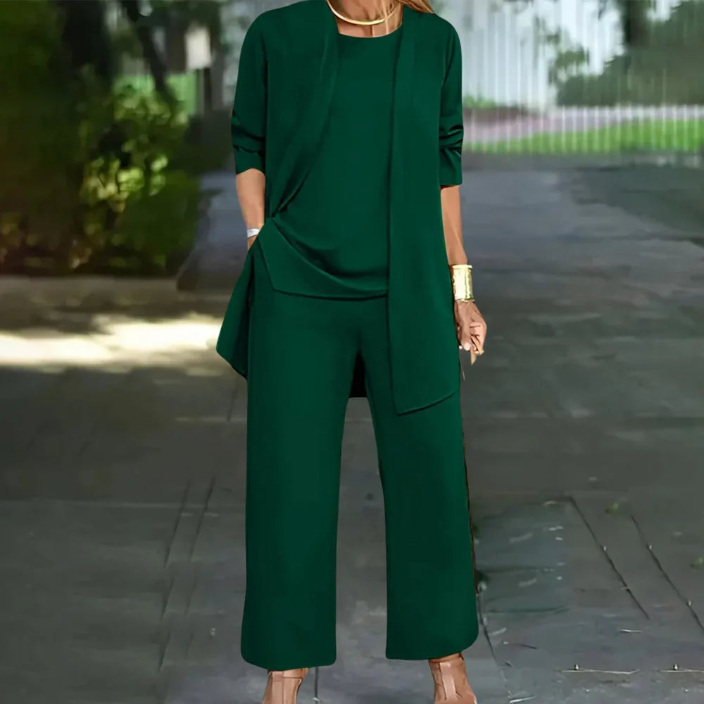 Elegant women's tailored three-piece pantsuit set with blazer, vest, and trousers. Perfect for business & formal wear.