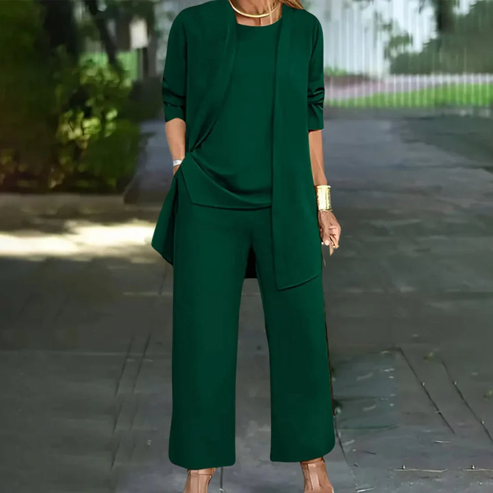 Elegant women's tailored three-piece pantsuit set with blazer, vest, and trousers. Perfect for business & formal wear.