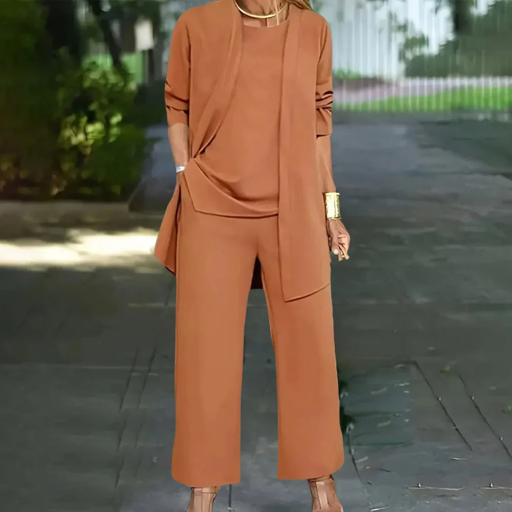 Tailored women's three-piece pantsuit set featuring a stylish blazer, vest, and straight-leg trousers for formal events.