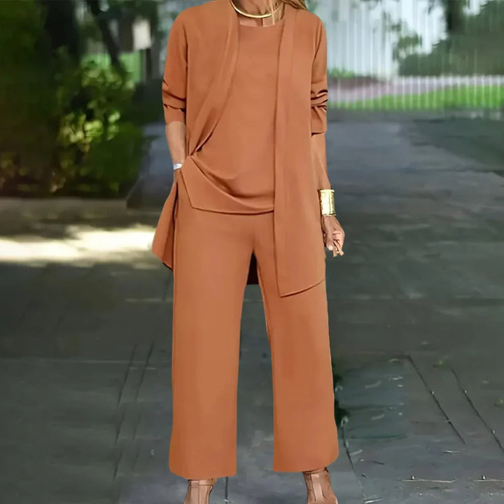 Tailored women's three-piece pantsuit set featuring a stylish blazer, vest, and straight-leg trousers for formal events.
