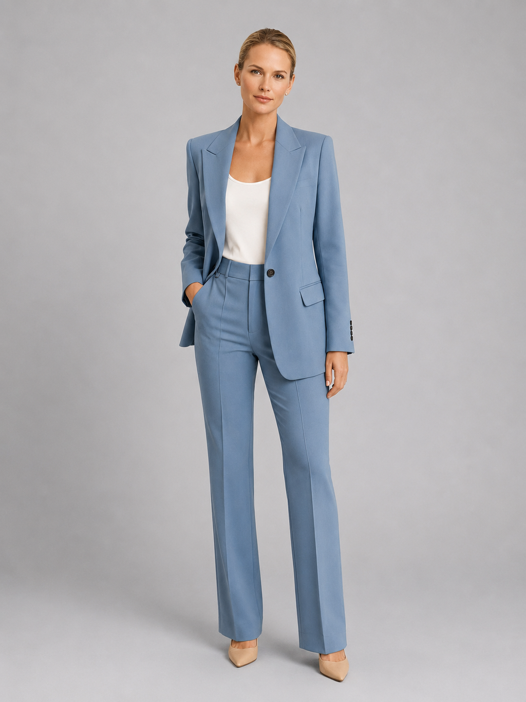 Women's occasion wear trouser suit, ideal for wedding guests, with a sophisticated blazer & formal high-waist trousers.