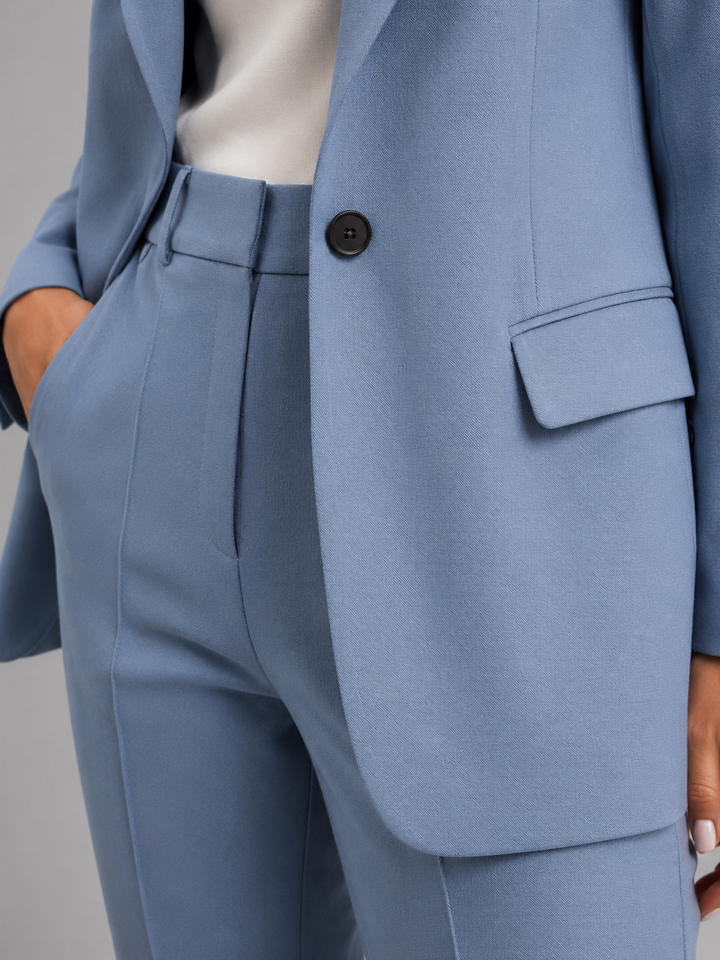 Sophisticated two-piece women's blazer & high-waist trouser set for elegant formal and business attire.