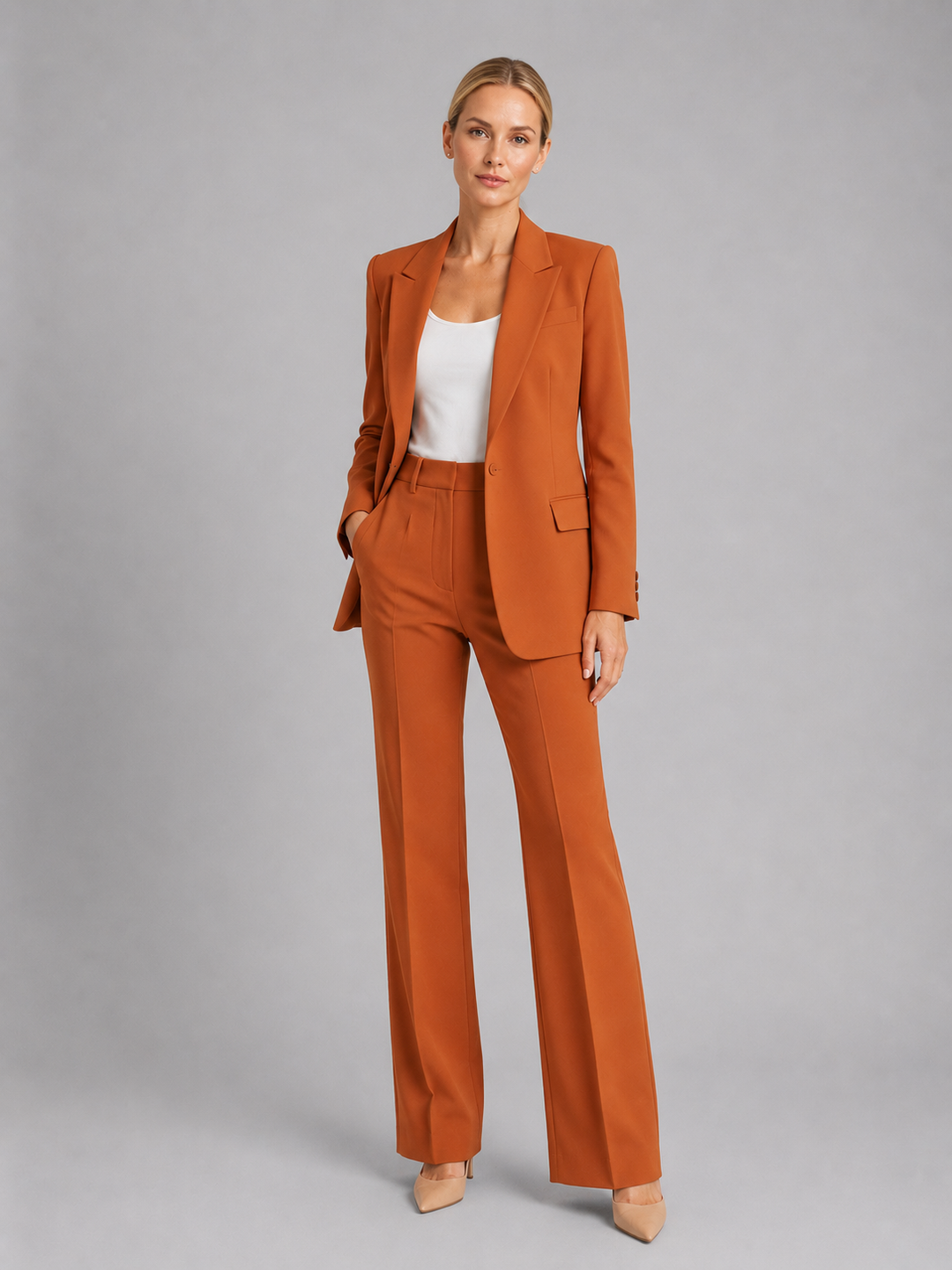 Versatile women's elegant trouser suit, a two-piece blazer & high-waist pants set for formal or smart casual events.