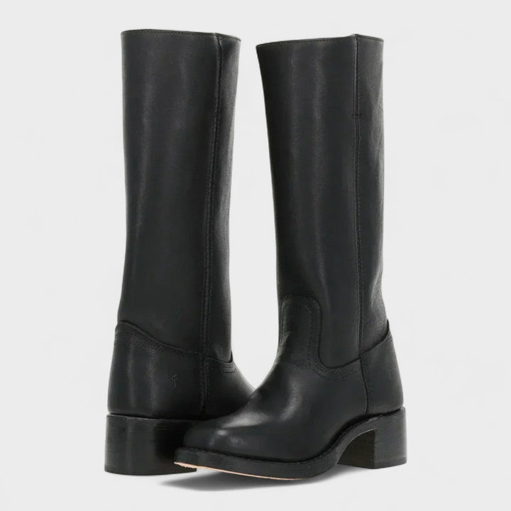 Stylish women's tall black boots, comfortable and elegant. Perfect knee-high fashion boots for winter.