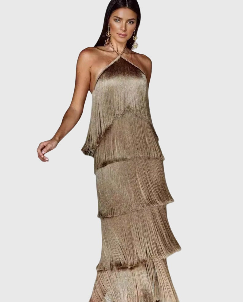 Full view: Elegant women's flowy tassel halter dress. Perfect for a glamorous party or evening event.
